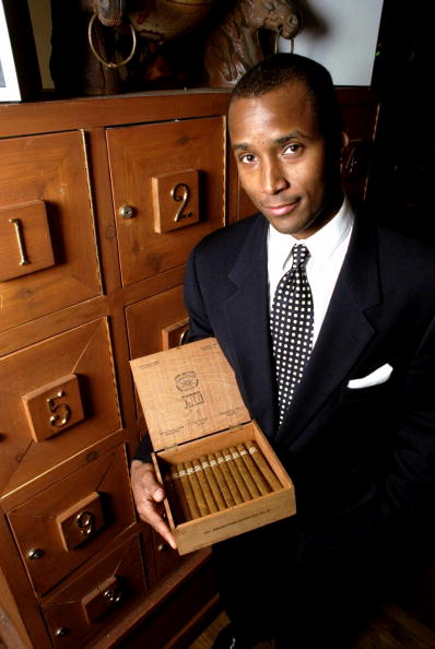 Granville Adams holds a box of pre-embargo 1962 Cuban Dunhil