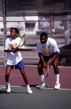 Tennis player Venus Williams practices in 1991 in Compton