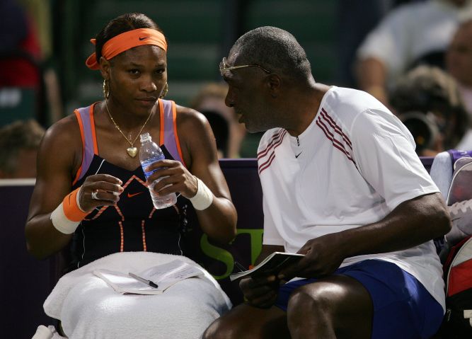 Serena Williams talks with her father Richard Williams after the first set against Nicole Vaidisova of the Czech Republic during their quarterfinals match on day eight at the 2007 Sony Ericsson Open at the Tennis Center at Crandon Park on March 28, 2007 i