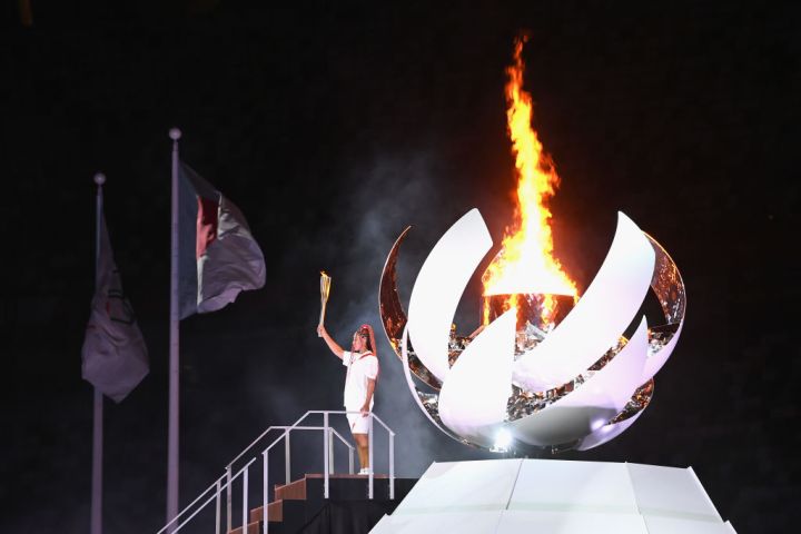 Naomi Osaka lighting the Olympic cauldron
