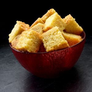 Cornbread cut into cubes in a bowl