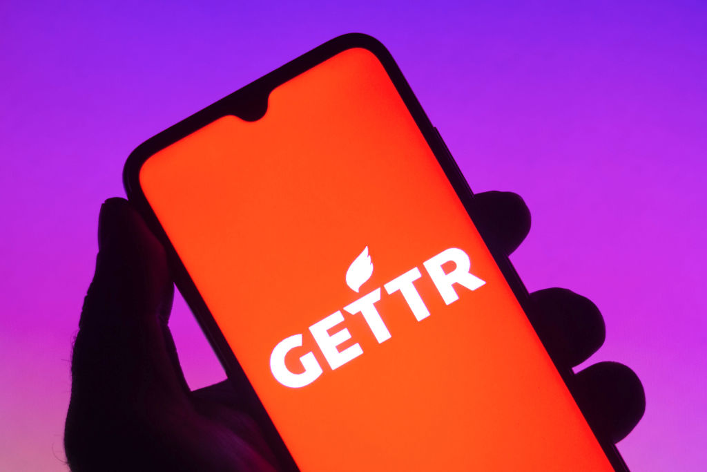 In this photo the Gettr logo seen displayed on a smartphone...
