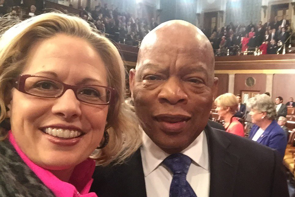 Kyrsten Sinema and John Lewis tweet