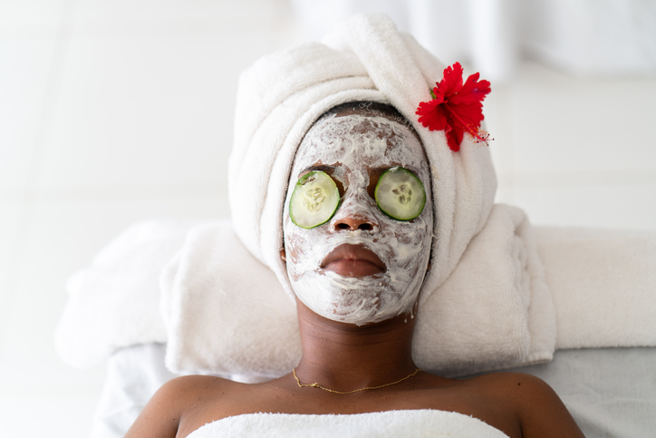 Black woman enjoying full spa treatment