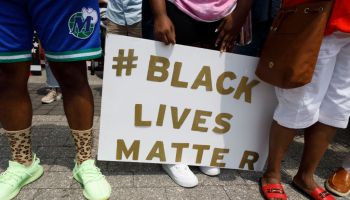 Supporters of Casey Goodson Jr. hold a # Black Lives Matter...