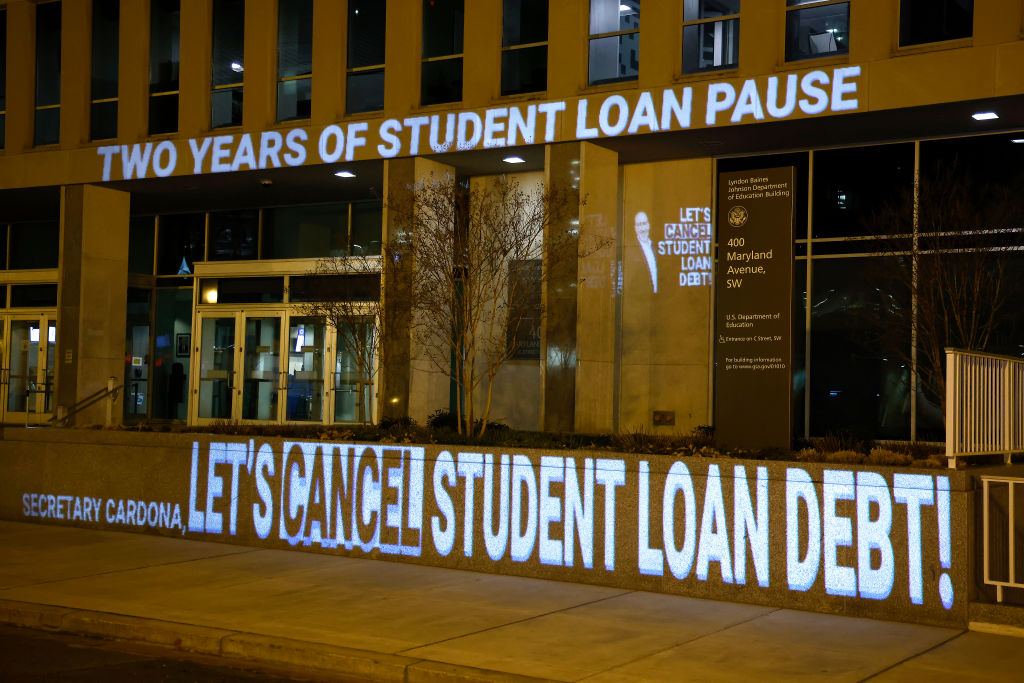 On The Second Anniversary Of The Student Loan Payment Pause Activists Project A Message Celebrating The Pause And Asking Secretary Cardona To Cancel Student Debt