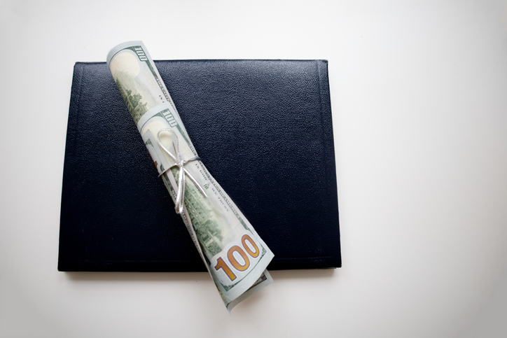school diploma wrapped in $100 bills & traditional leather diploma binder