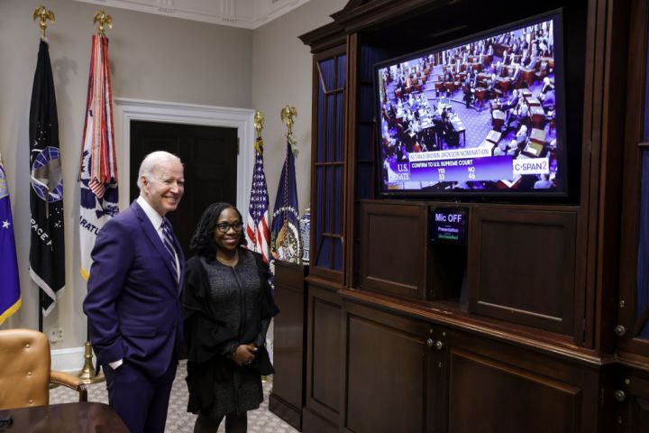 WASHINGTON, DC - APRIL 7: President Joe Biden congratulates Ket