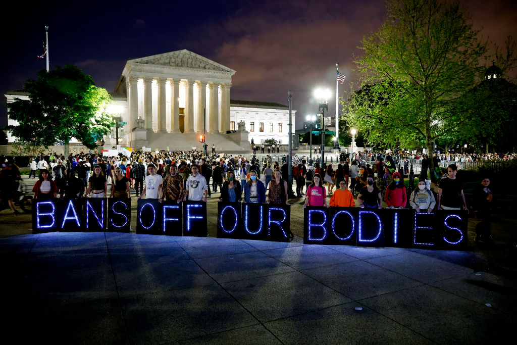 MoveOn And Abortion Access Activists Rally Outside SCOTUS To Demand Keep The #BansOffOurBodies