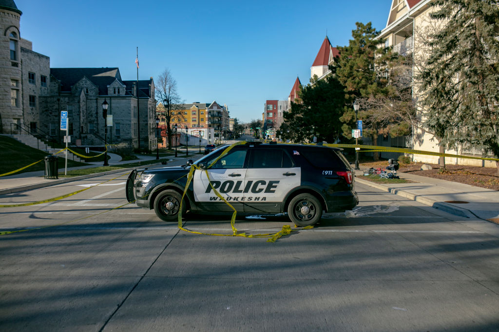 Car Drives Through Holiday Parade In Waukesha, Wisconsin