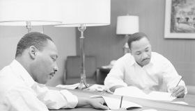 Martin Luther King Sitting at a Hotel Desk