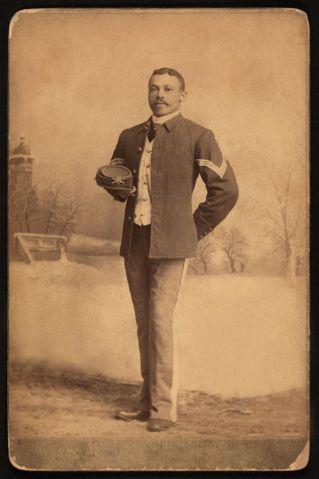 Buffalo Soldier, 25th Infantry, Full-Length Portrait in Uniform Holding Hat, Fort Custer, Montana, USA, by Orlando Scott Goff, William A Gladstone Collection of African American Photographs, 1880s