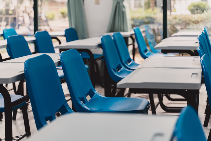 Empty classroom interior with modern desk and seat