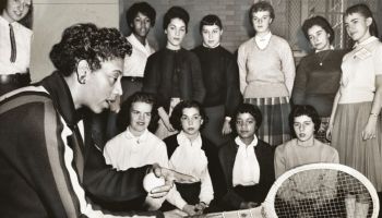Althea Gibson, U.S. and Wimbledon tennis champion, with female students at Tennis Clinic, Midwood High School, Brooklyn, New York, USA, Ed Ford, New York World-Telegram and the Sun Newspaper Photograph Collection, December 1957
