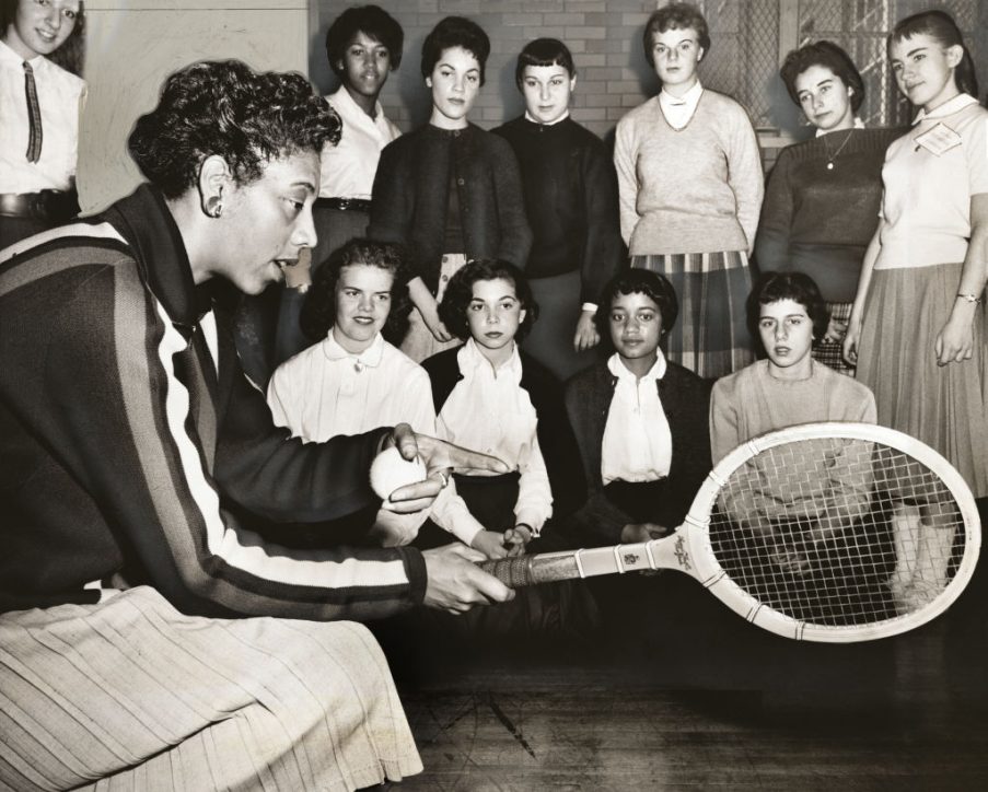 Althea Gibson, U.S. and Wimbledon tennis champion, with female students at Tennis Clinic, Midwood High School, Brooklyn, New York, USA, Ed Ford, New York World-Telegram and the Sun Newspaper Photograph Collection, December 1957