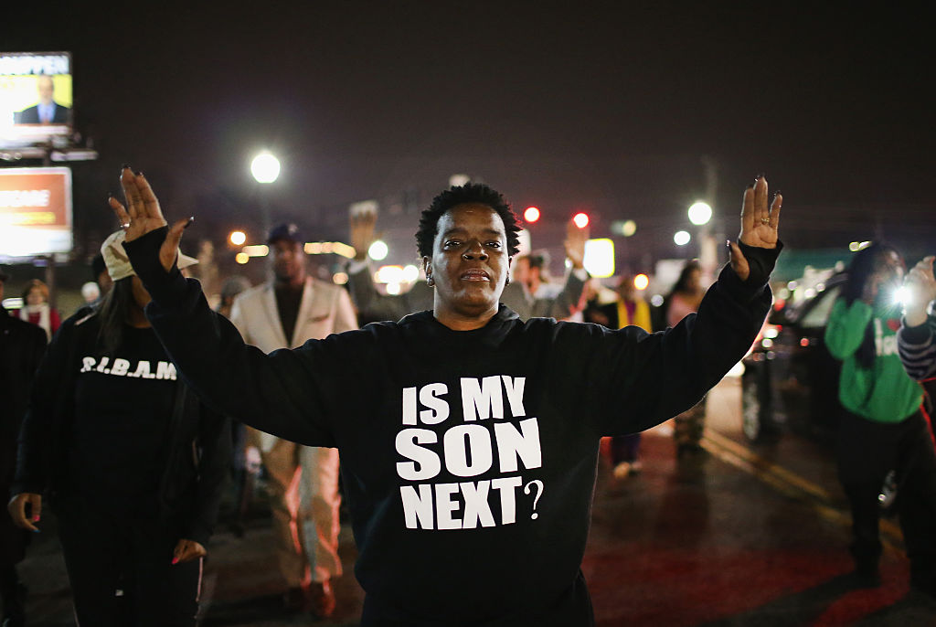 Police Officers Shot During Protests After Ferguson Police Chief Resigns