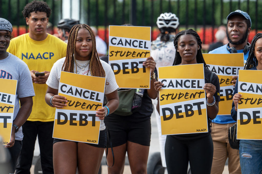 WASHINGTON, DC - AUGUST 25: Student loan debt activists rally o