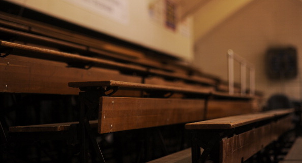 Wooden pull-out bleachers line both sides of The Dick Katte Athletic Center, built in 1959-60, Monday, November 07, 2011, at Denver Christian High School. The gym that is name after the school's head varsity basketball coach, who has been on the job for 4