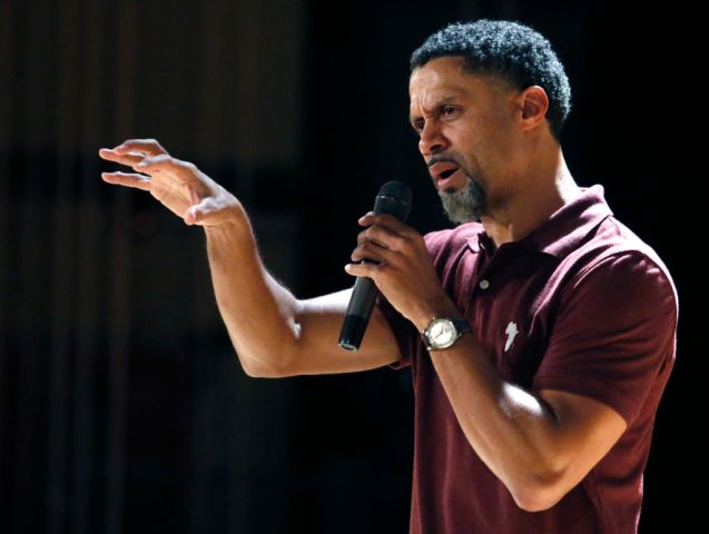 Former NBA player Mahmoud Abdul-Rauf meets with a group of Mission High School students, including members of the football team, to talk about social justice and activism in San Francisco, Calif. on Friday, Oct. 21, 2016