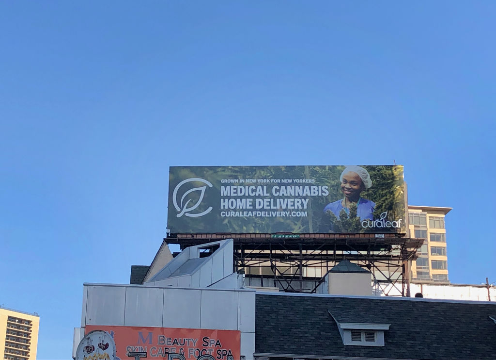 CuraLeaf, billboard promoting Medical Cannibis Home Delivery service, Queens, New York