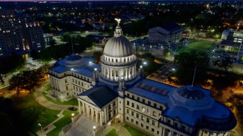 High Angle Drone Shot of State Capitol Building in Jackson, MS at Night