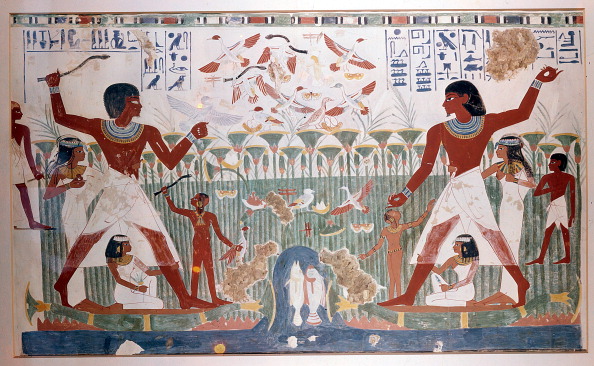 Ancient Egyptians hunting wildfowl with throwing sticks.