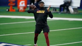 Dwayne Haskins family wife partial settlement blackmail robbery