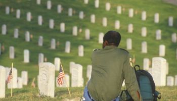African-American Veteran Sitting in Cemetery, Los Angles, California