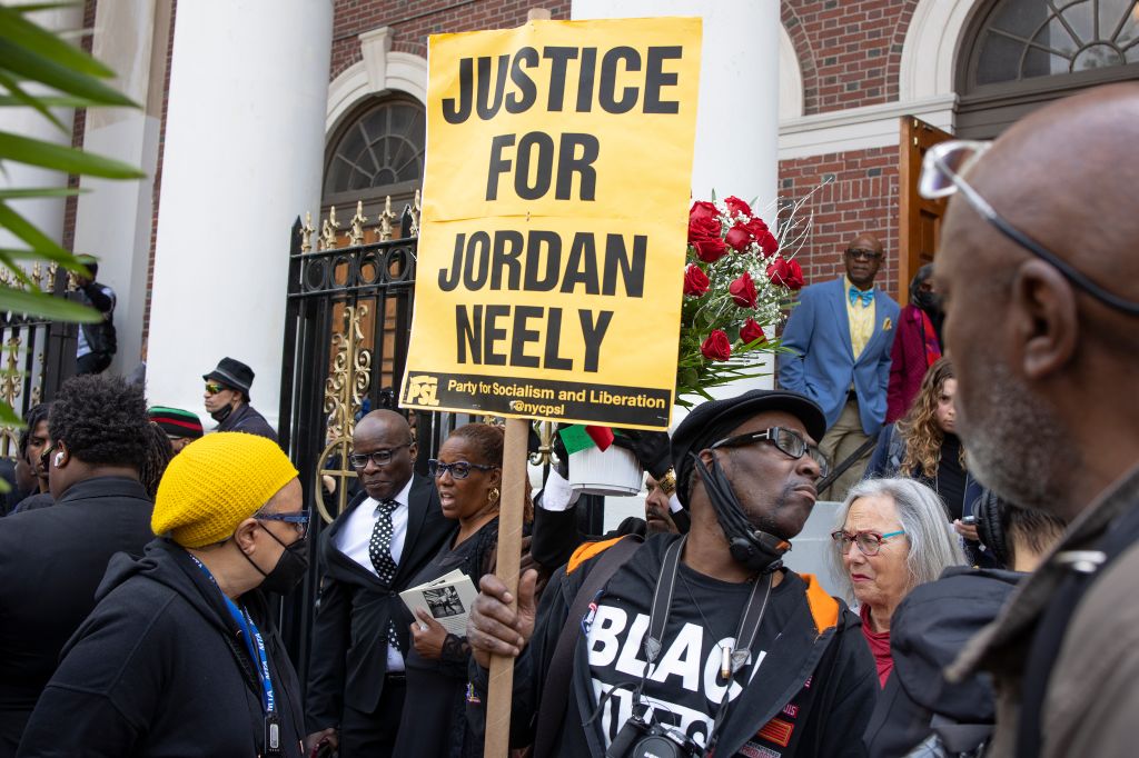 People attend the funeral for Jordan Neely