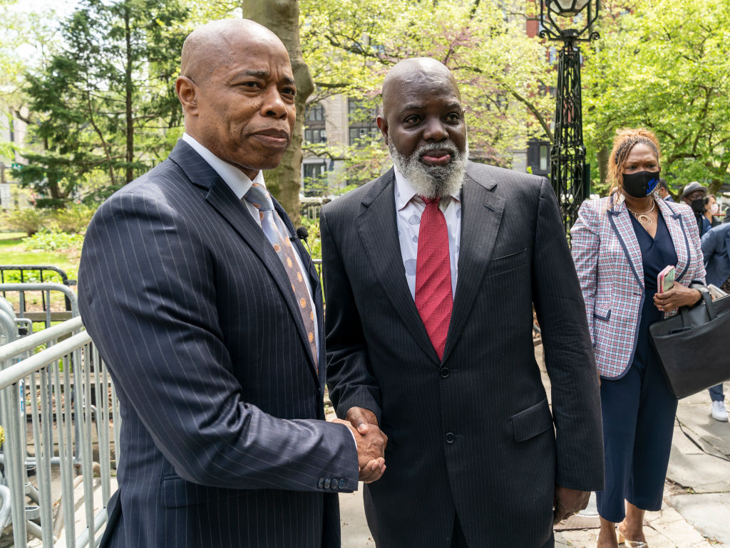 Eric Adams and Abner Louima pose after the latter endorsed...