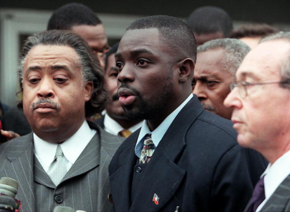 Haitian immigrant Abner Louima speaks briefly to t