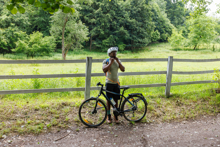 Mountain Biker Is Riding A Bicycle In The Countryside