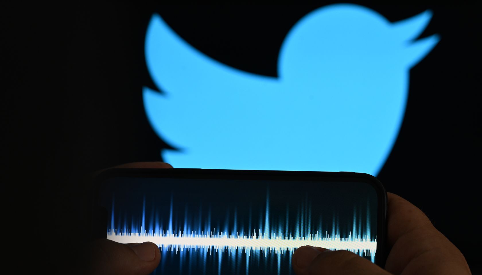 In this photo illustration, the logo of Twitter