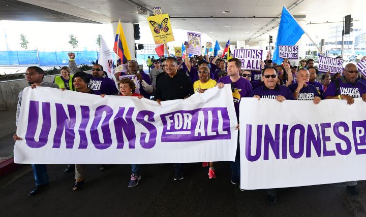 Activist Reverend Jesse Jackson joins airport "Unions for All" movement