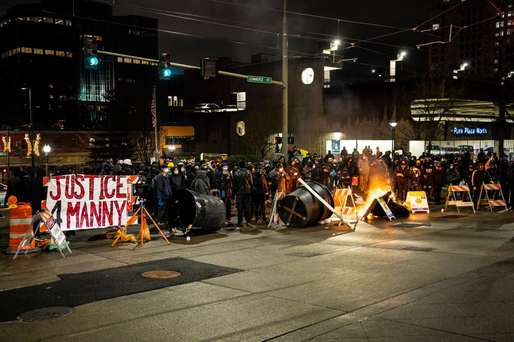 Protesters Rally Against Police After Officer Drives Through Crowd In Tacoma, Washington