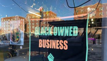 Black Owned Business sign in local storefront window, MisFits Nutrition, Queens, New York