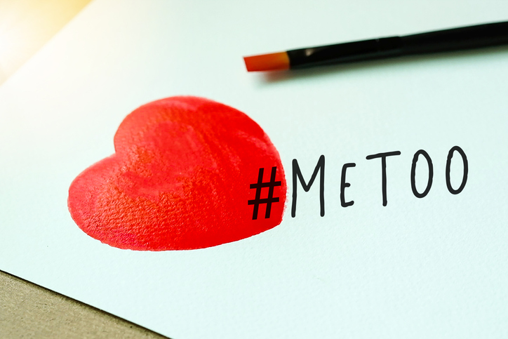 Watercolor red heart and paintbrush with MeToo hashtag on white background. #metoo as a new movement. As part of anti sexual harassment.