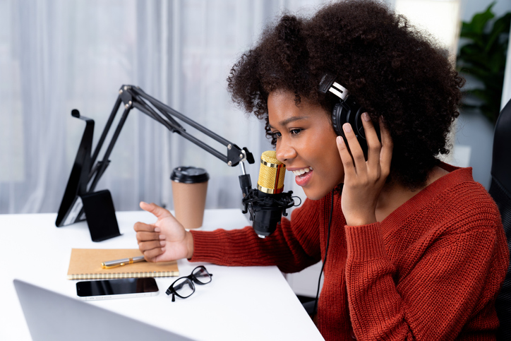 Host channel of African woman talking with listener in broadcast. Tastemaker.