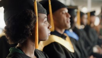 Students, graduation ceremony and group or university education achievement, diploma or scholarship. Men, women and crowd diversity at study academy in America for academic future, goals or college