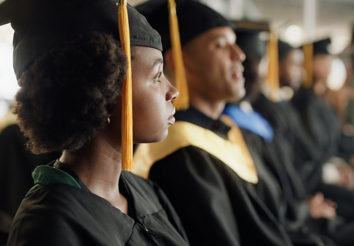 Students, graduation ceremony and group or university education achievement, diploma or scholarship. Men, women and crowd diversity at study academy in America for academic future, goals or college