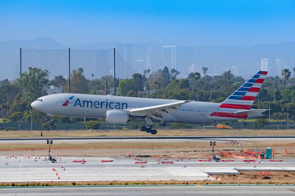 Lawsuit Claims American Airlines Kicked 8 Black Men Off Flight For ...