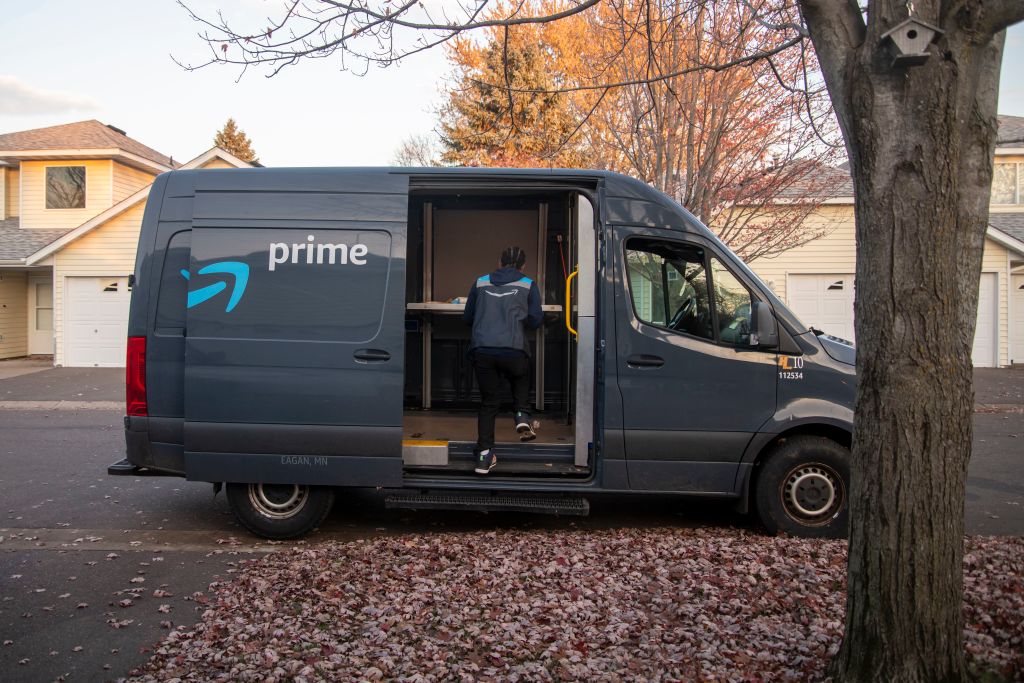 Amazon Prime delivery truck making neighborhood deliveries.