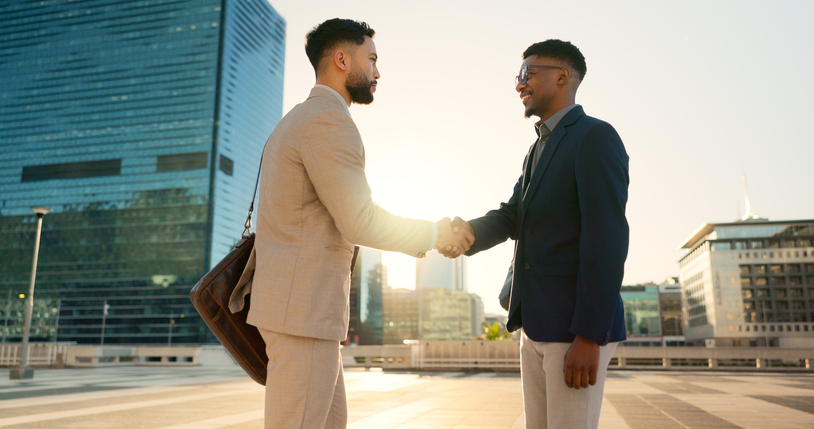 Black men build, Men's Circle, New Men Tour Networking, walking or business people shaking hands in city for project agreement or b2b deal. Teamwork, outdoor handshake or men meeting for a negotiation, offer or partnership opportunity together