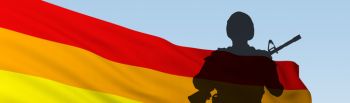 silhouette soldier against flag of LGBT