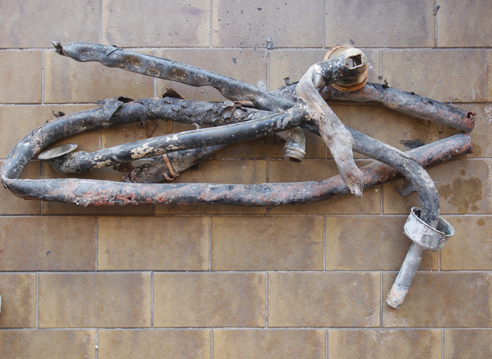 corroded lead pipe