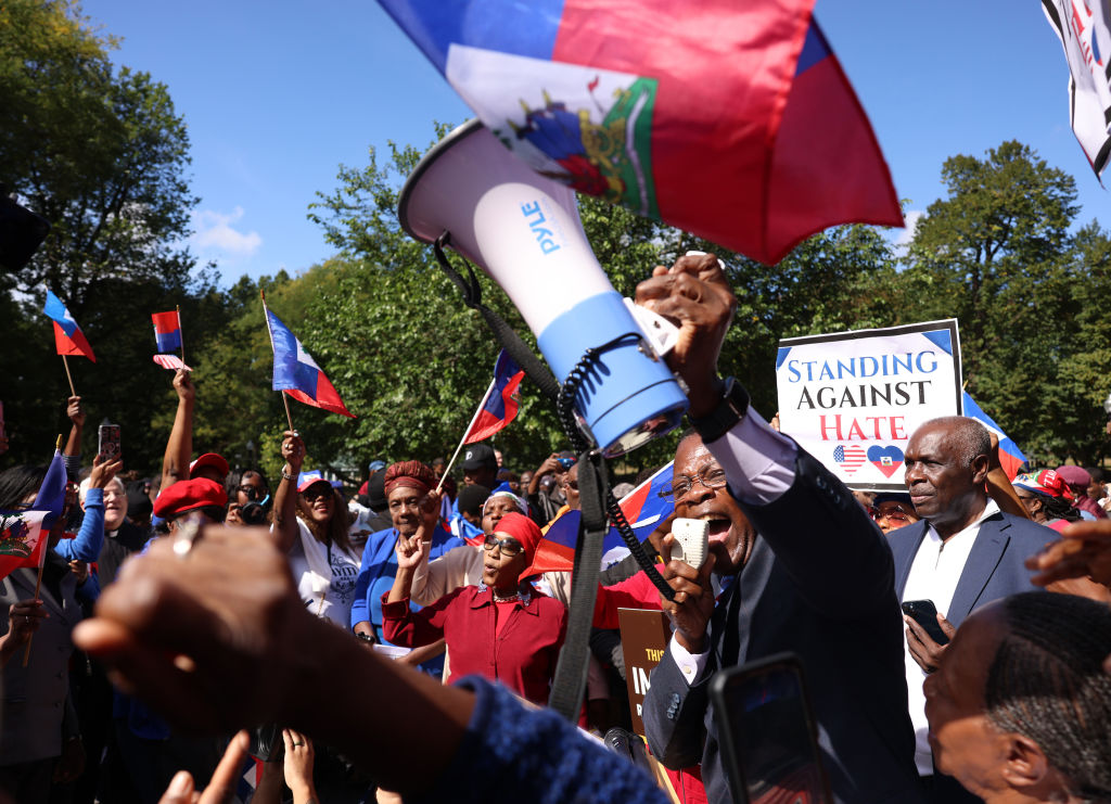 'We defeat hate together.' Haitians, others rally in Boston after Trump, Vance target Haitians in Springfield, Ohio.