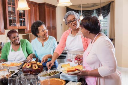 African-American women serving home cooked meal
