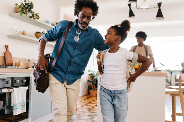 Morning routine: Father and daughter getting ready for school
