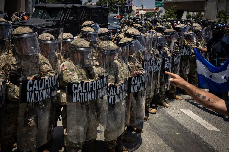 Protesters clash with law enforcement in downtown Los Angeles near the Federal Building and the Metropolitan Detention Center due to the immigration raids in LA.