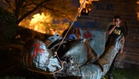 TOPSHOT-US-POLITICS-RACISM-STATUE-UNREST